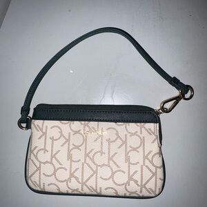 Calvin Klein Cream and Black Women's wristlet